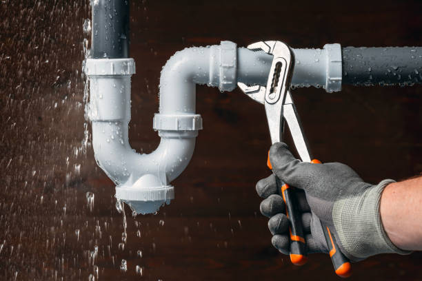Professional Emergency Plumber technician working in Baldwin City, KS